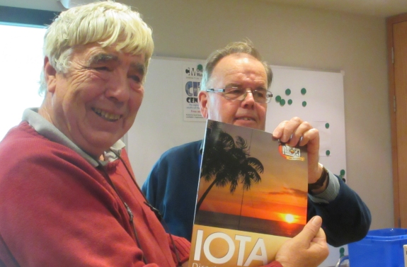 Carl resenting the 12 month raffle prize