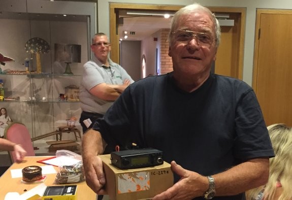 Dave G0NAX, winning a 2m icon rig in the society's raffle