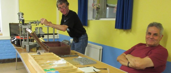 Jim 2E0JTW and Clive G1EUC setting up the badge engraver