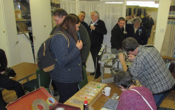 Jim 2E0JTW and Glynis 2E0CUQ busy with badges